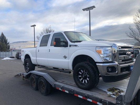 Truck being delivered.