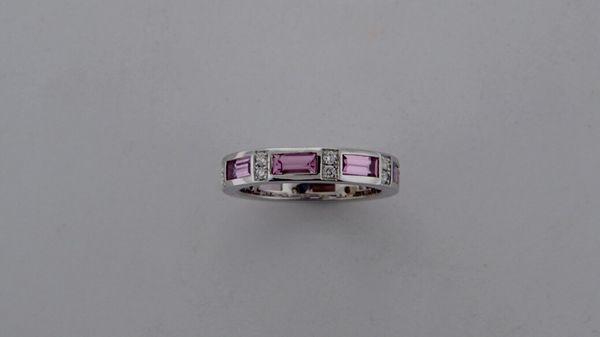 Pink sapphires with pave diamonds.