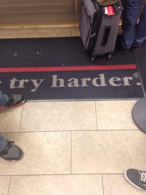 Carpet inside the 11th St. Avis. Yes, definitely "try harder" Avis because you're doing a crap job.