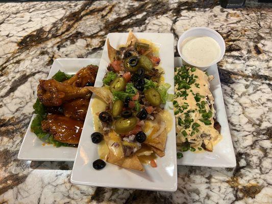 Mango habanero wings, loaded nachos, dirty fries.