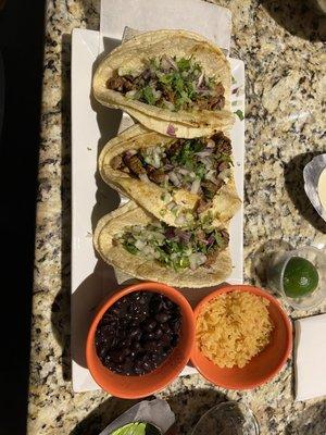 Tacos de Carne Asada, black beans and rice