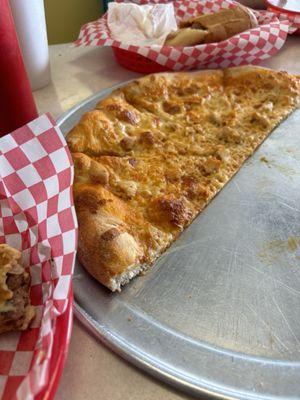 Half of the buffalo chicken pizza!