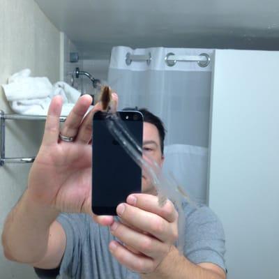 Roach on the bathroom mirror. YUCK!