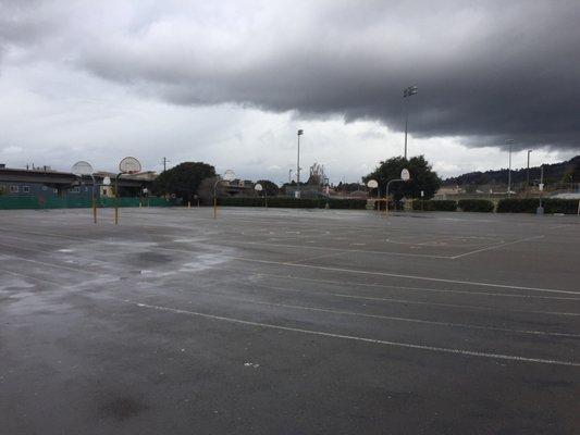 Basketball courts on the blacktop. Also used as parking Open after 3:05pm on school days.