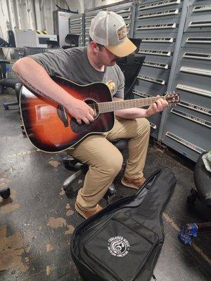 He couldn't wait to start playing his new guitar  Thank you, Brad!