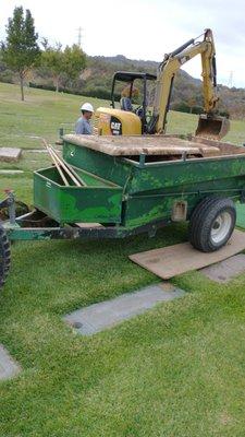 after the ceremony, it didn't take them long to close the lid and put sod on top.