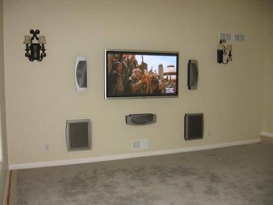 This Home Theater used high end speakers with custom made and paint matched trim.