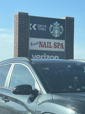 Store sign - it is next to a starbucks which is never a bad thing!