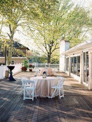 Patio set for cocktail hour. Overlooks the beautiful gardens and the Chesapeake Bay