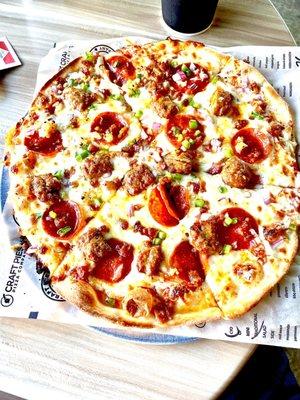 Traditional pizza spicy red sauce, pepperoni, Italian sausage, red onions, green pepper's and garlic.