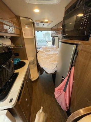 Winnebago travato interior, bed, bathroom.