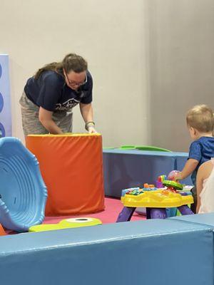 Employees keeping up with cleaning of the baby play place.