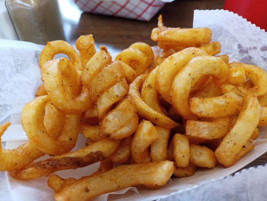 Seasoned curly fries. Not as heavily seasoned as Arby's, but similar. And yummy.