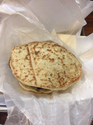 Falafel Sandwich- Pita Bread, Israel Salad, Tahini Sauce ($8.00)