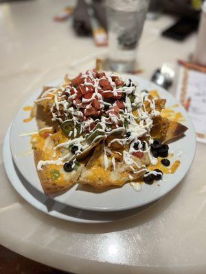 Macho Nachos w/ spicy shredded chicken