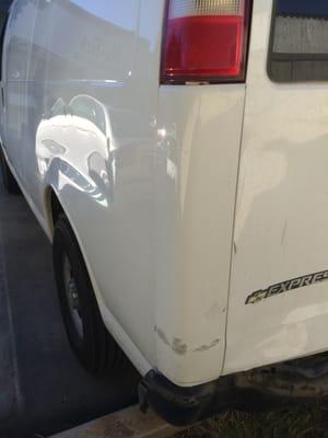 Chevy Express Van in with rear damage. Fixed through Insurance.