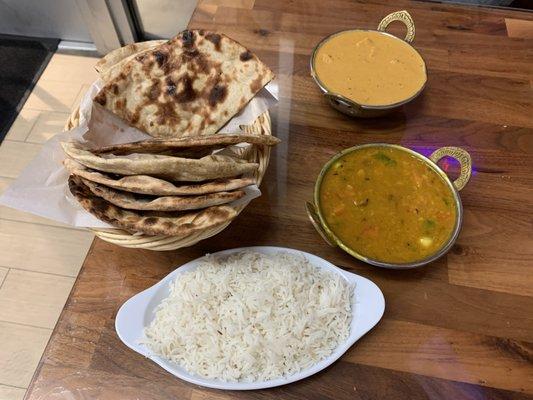 butter nans, tandoori roti, paneer tikka masala, tadka dal and jeera rice.