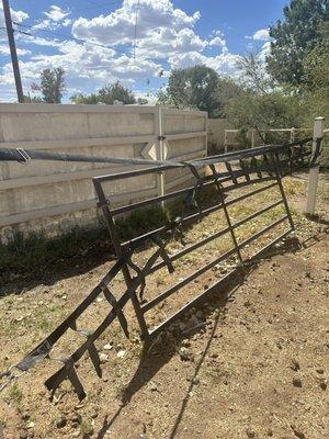 Gates falling down held together by baking wire.