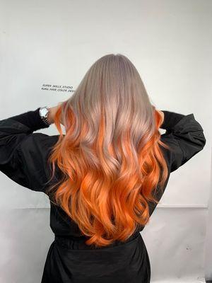 Two toned hair color. Gray and orange. Beautiful.