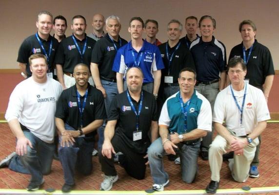 Dr. Austin (center) with NFL team chiropractors at the 2011 annual meeting of the Pro Football Chiropractic Society.