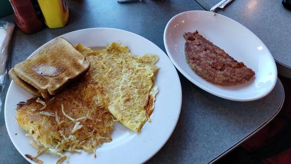 Cheese Omelet with Hash Browns/ Toast and a side of Corned Beef Hash...