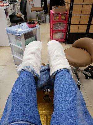 Hot towels and paraffin wax booties