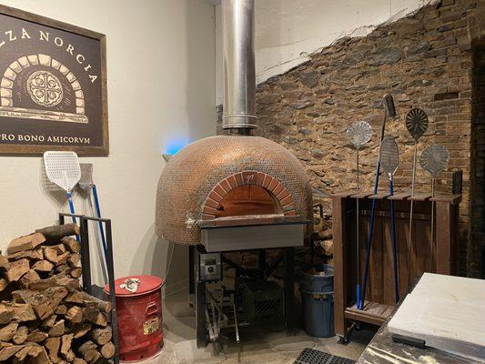 Copper pennies ador the wood fired pizza oven