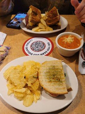 Chicken panni, half and tomato basil soup