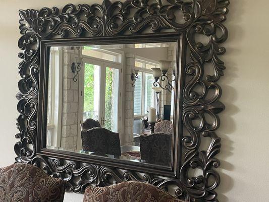 This mirror is a pain to keep dust free.  It is always dust free after they leave.