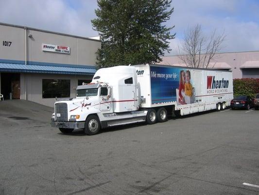 Wheaton interstate truck in front of Federal Way warehouse