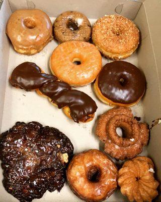 A huge Apple fritter and a variety of donuts