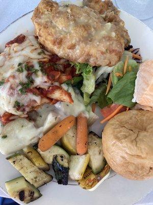 Salad, asiago potatoes, dinner roll, mixed veggies, pasta in red sauce, chicken and a small piece of salmon off to the side.