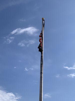 Frisco, TX post office flag tangled.