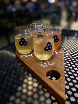 Hard Kombucha Flight: Strawberry Lemonade, Ginger Lime, Peach Iced Tea, Apricot Earl Grey.