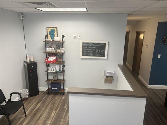 NNC Waiting Room with children coloring and white board wall station