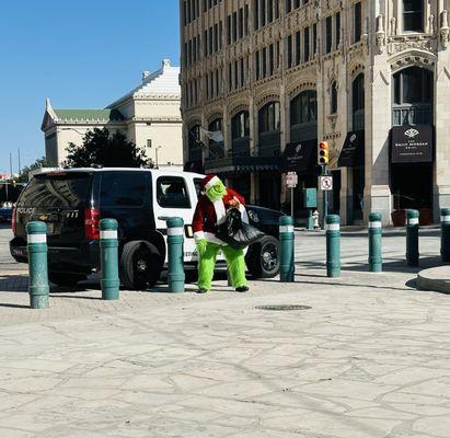 By Allamo Plaza in front of US Post Office and Court House