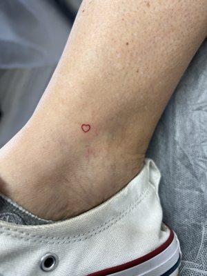 Tiny tattoo by Julie