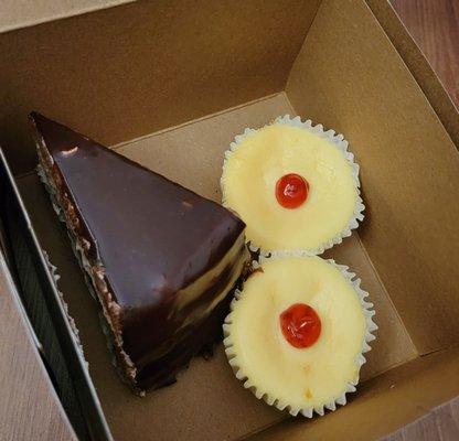 White chocolate mousse cake slice and mini cheesecakes