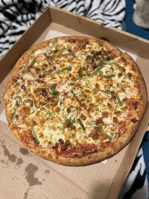 Beef sausage and green pepper pizza