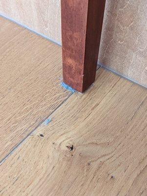 dusty chair legs and floors in kitchen