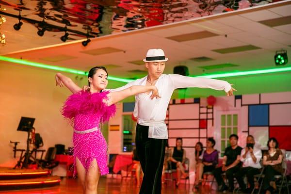 Our professional and experienced instructors Mr. Huang and Lily performing the hot ChaCha! Way to go!