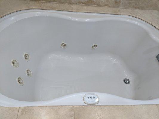 Bath tub previously stained was left looking like new without a spot.