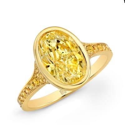 Fancy intense oval ring.