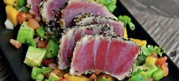 Ahi tuna over fresh summer avocado mango salsa