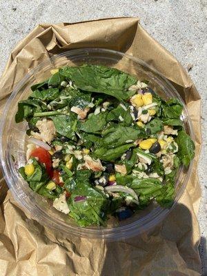 My delicious spinach salad with diced chicken, black olives, tomatoes, red onion, shredded mozzarella, corn with balsamic vinegar $14