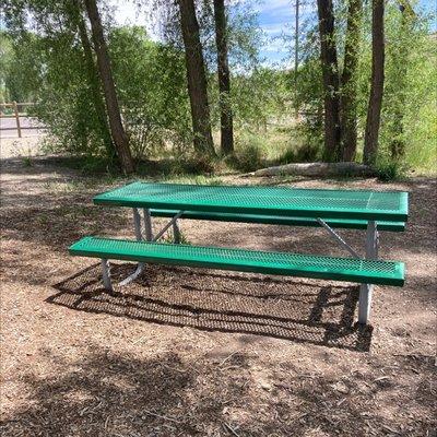 Picnic tables to sit and relax while the fur babies play