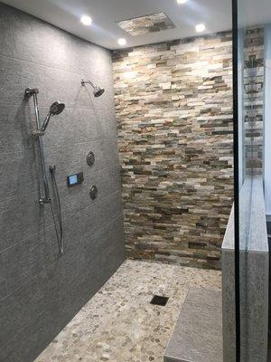 Digital shower controls with 5 shower head options.