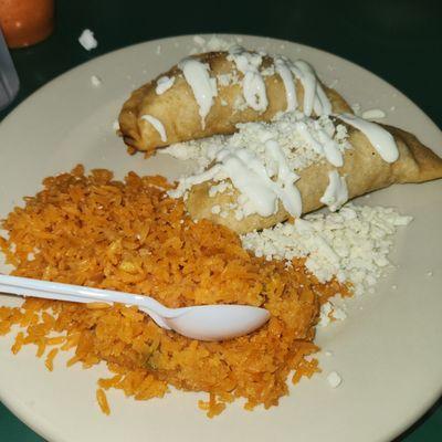 Empanadas 2 Tinga de Pollo Empanadas absolutely delicious! I highly recommend this tiny restaurant.  Also the food came wicked fast.