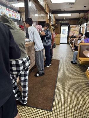 Restaurant Order Counter & Front Tables - Restaurant has not been remodeled for years but prices have drastically increased.