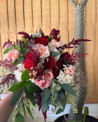 The bridal bouquet from our one bad review who claimed they were wilted. These are the photos we took as they went out the door.